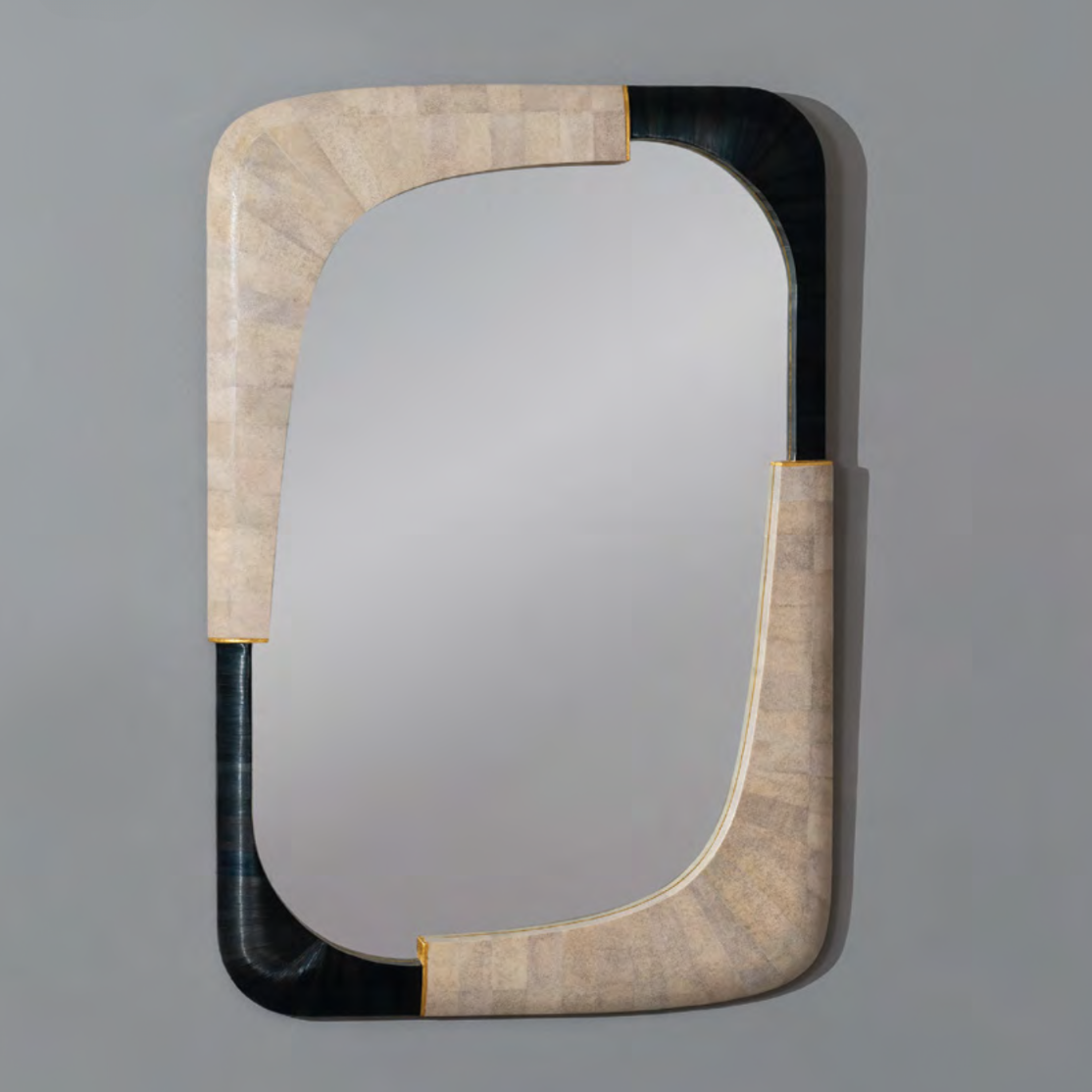 Rectangular mirror with a decorative frame on a gray background